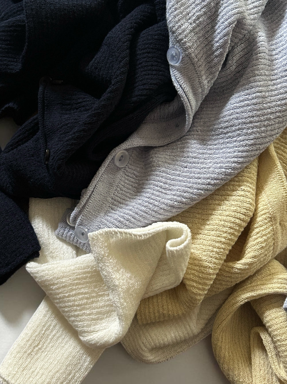 Asymmetric button-down リブカーディガン